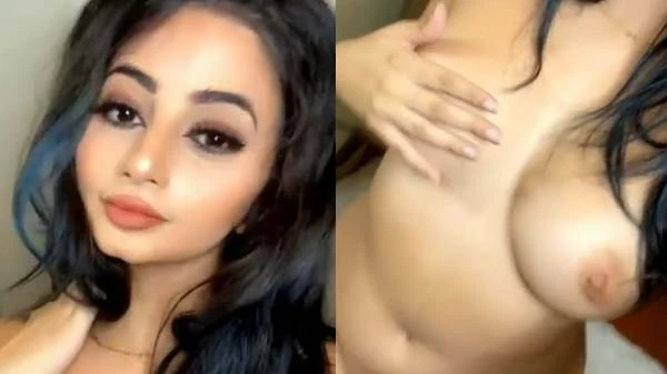Young Lady Flaunting Breasts in Kerala Sex Video